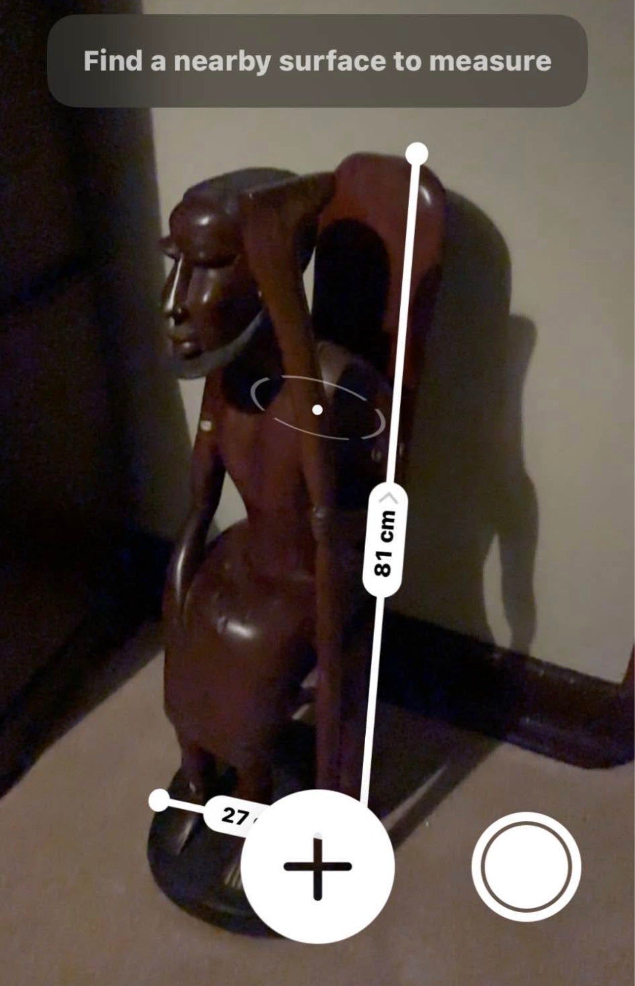 African Hand-Carved Seated Figure with Staff